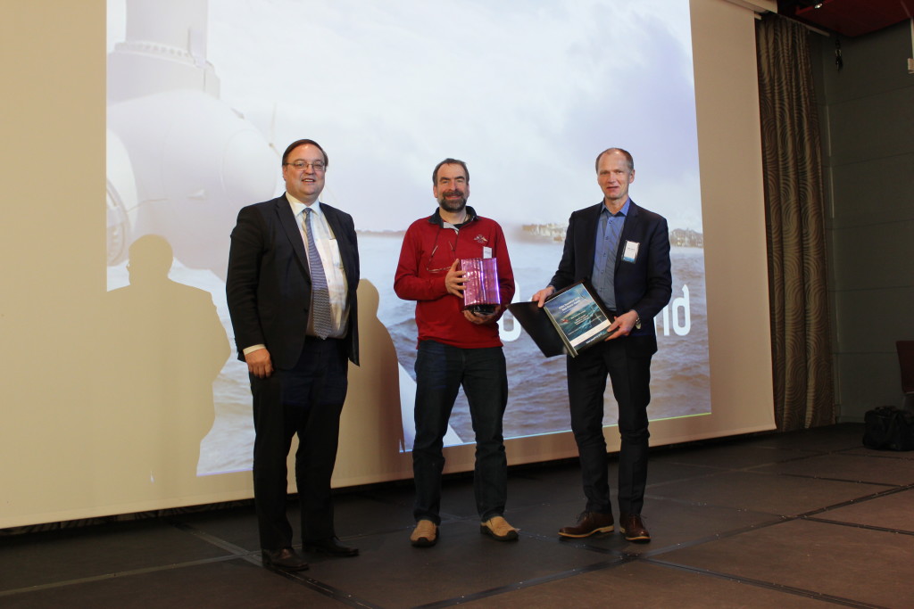 Joachim Reuder (University of Bergen, middle) receiving the Best Poster Award at DeepWind from Prof Trond Kvamsdal (Chair NOWITECH Scientific Committee, left) and John Olav Tande (Director NOWITECH, right)