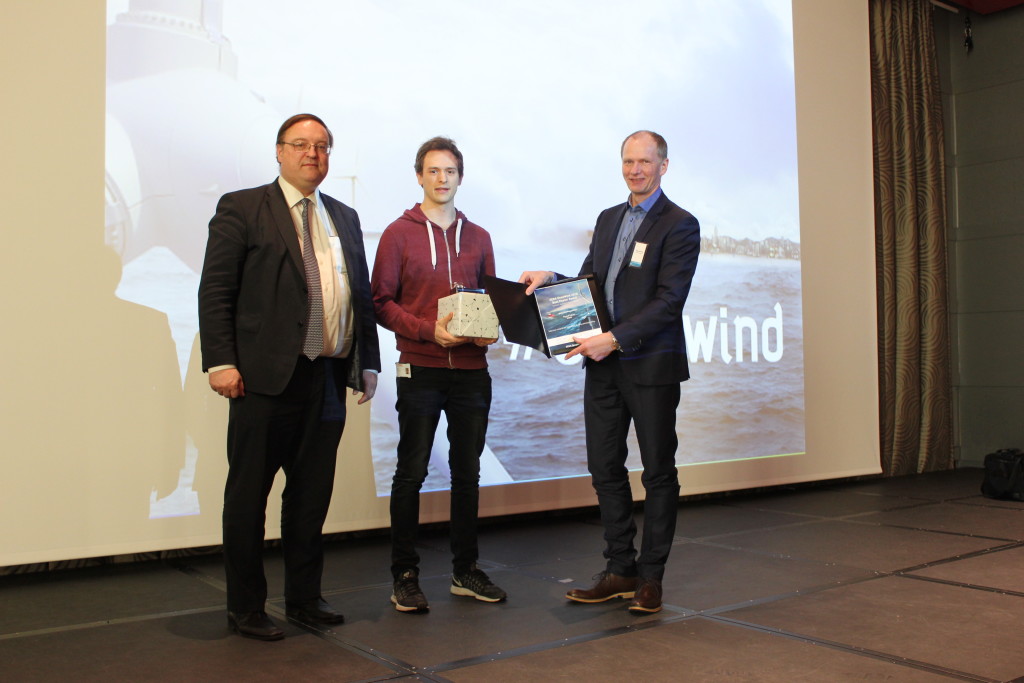 Trygve Løken (NTNU, middle) receiving the Best Poster Award at DeepWind from Prof Trond Kvamsdal (Chair NOWITECH Scientific Committee, left) and John Olav Tande (Director NOWITECH, right)