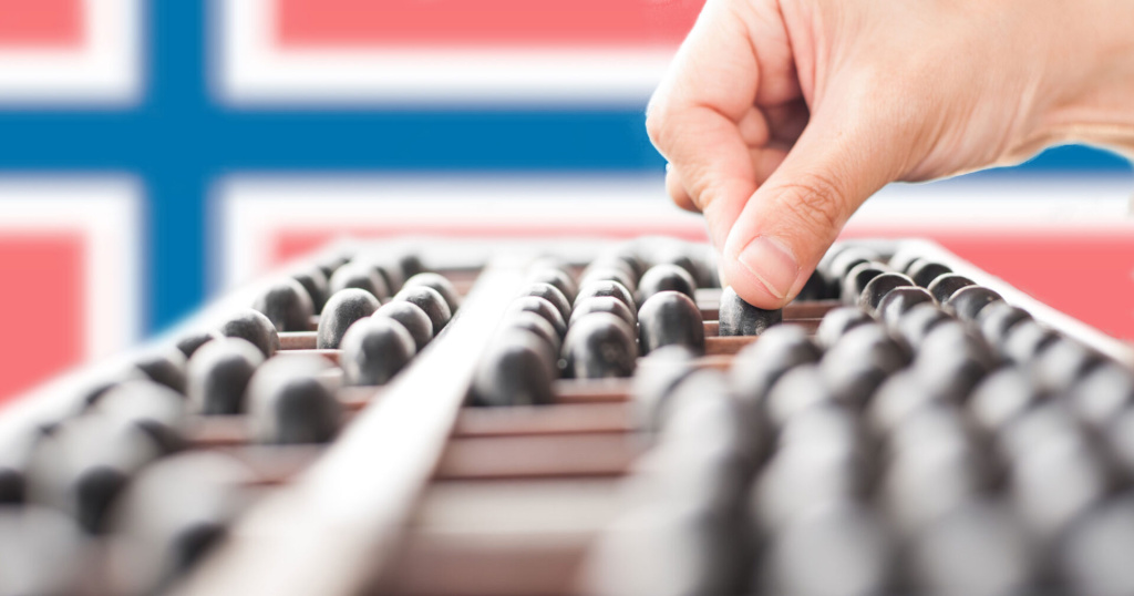 Hand using an abacus with Norway flag in background