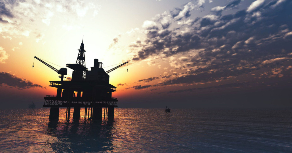 Oil rig at sunset