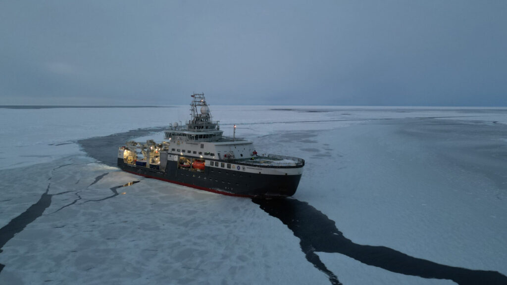 RV Kronprins Haakon sailing through sea ice