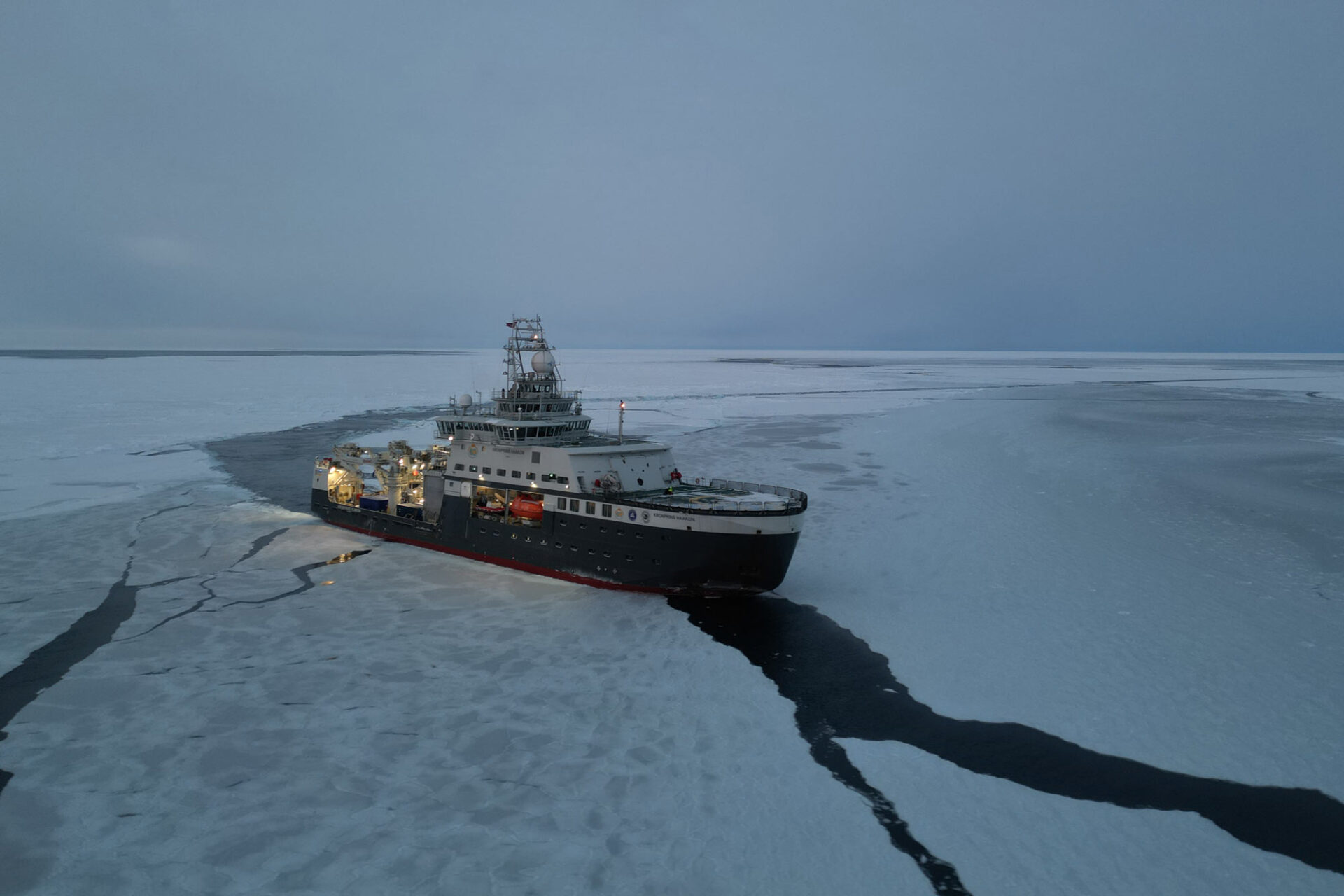 RV Kronprins Haakon sailing through sea ice