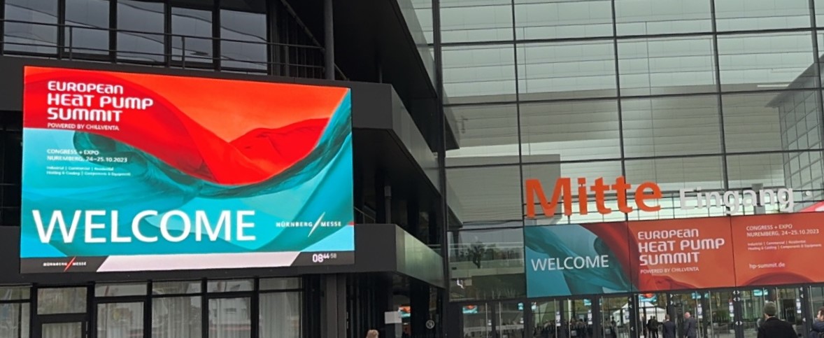 Entrance to an exhibition hall with a banner announcing the European Heat Pump Summit