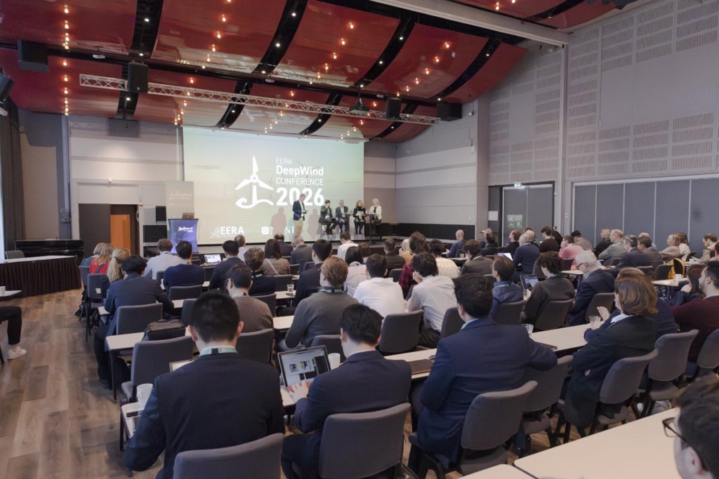 A large group of people attending a conference.